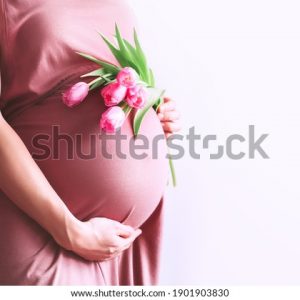 beautiful-pregnant-woman-tulips-flowers-600w-1901903830