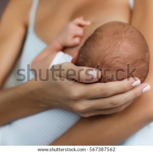 mother-breastfeeding-her-newborn-baby-600w-567387562